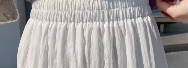 Grace- Elegant semi high low maxi skirt with ruffled trim